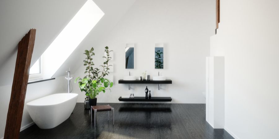 Ein kleines, elegantes Badezimmer mit schwarzen Accessoires und grünen Akzenten 